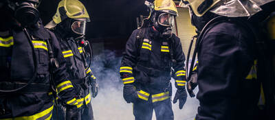 Firefighters wearing PPE