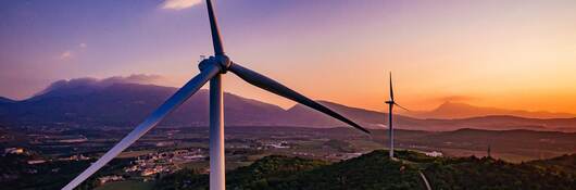 Closeup of a wind turbine at dawn