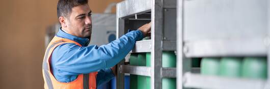 Engineer checking gas cylinders