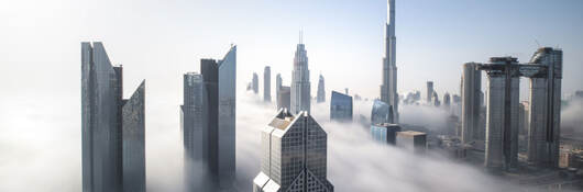 Dubai Downtown skyline on a foggy winter day.