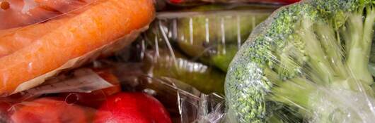 Fresh vegetables in cellophane bags