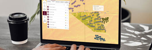 Person using laptop to view a wind map in Windnavigator®