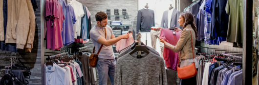 Couple buying clothes