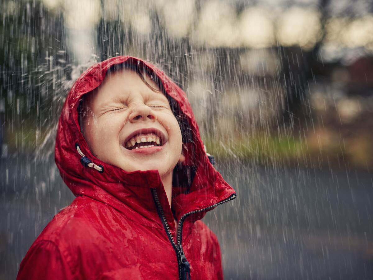 Boy in rain.