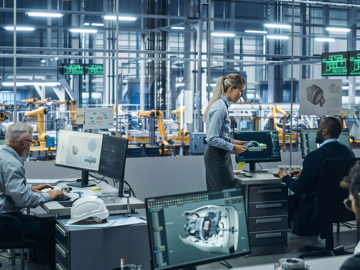 Engineers at work in an industrial setting