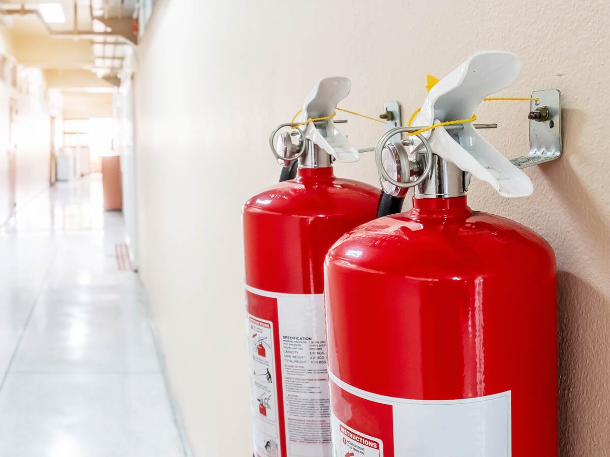 Fire extinguishers handing on a wall