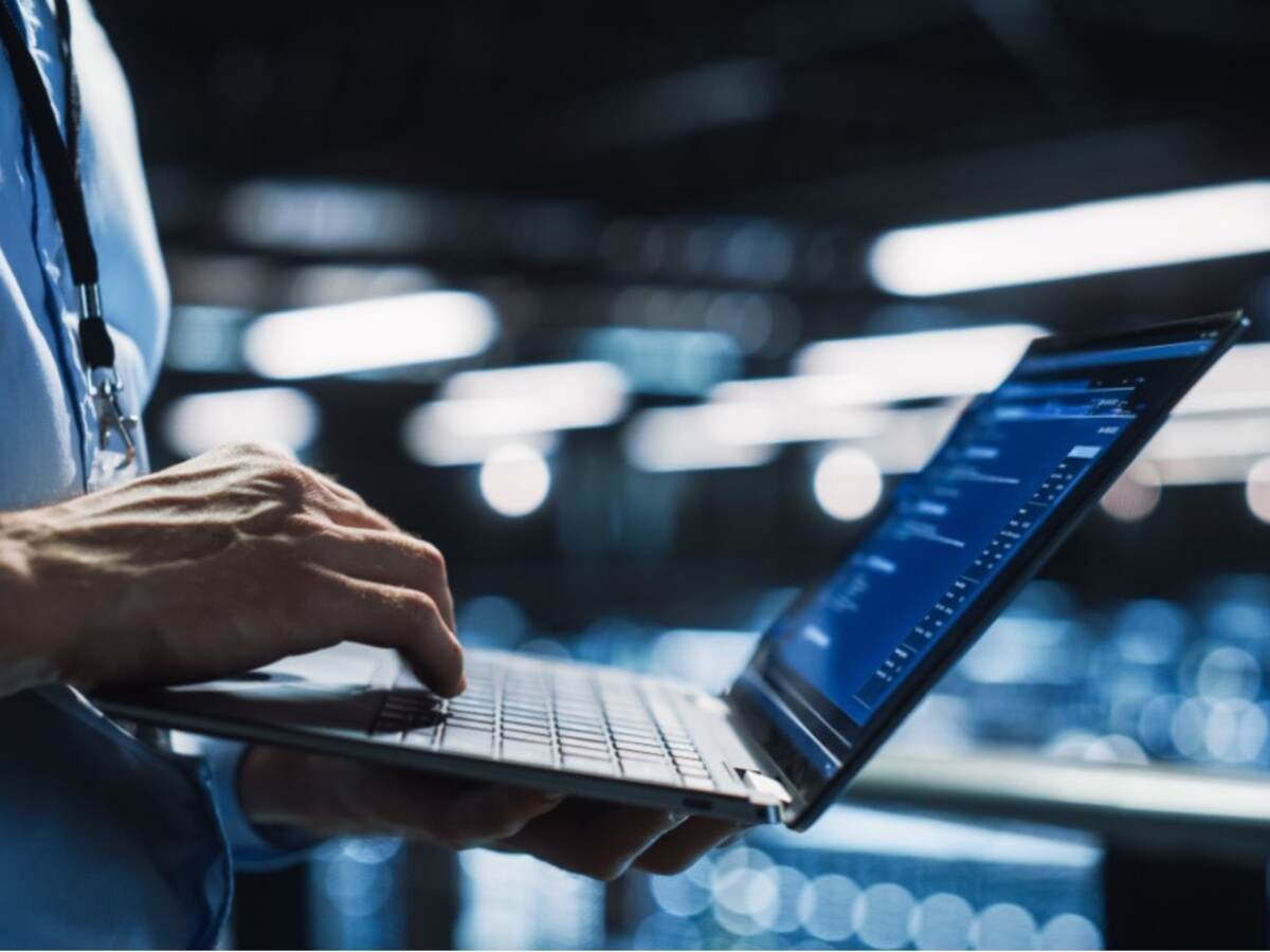 Man holding laptop