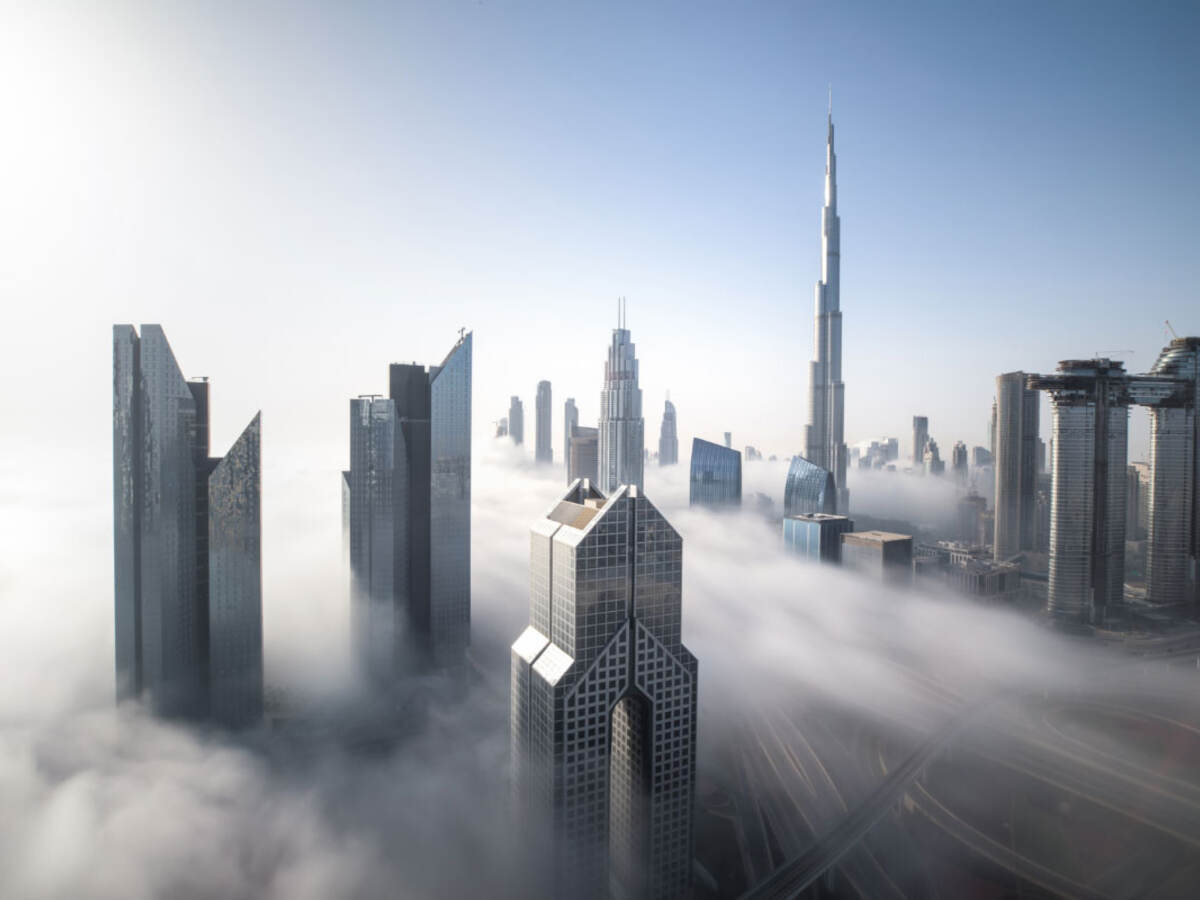 Dubai Downtown skyline on a foggy winter day.