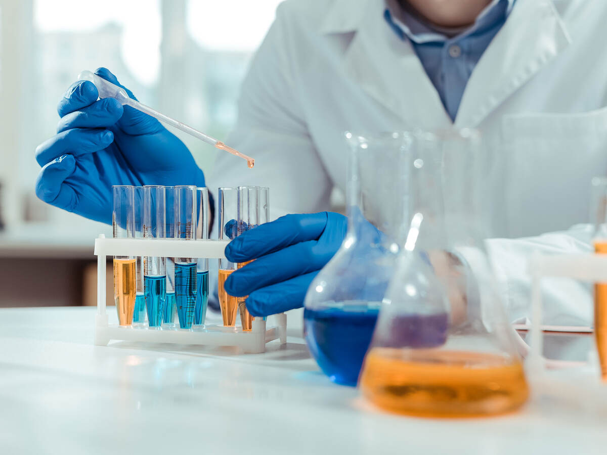 Close up of test tubes being used in chemical lab