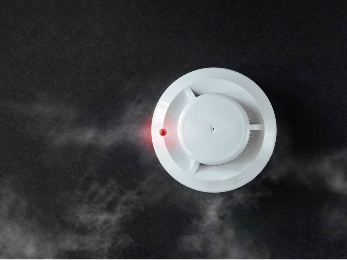 smoke alarm on a black background