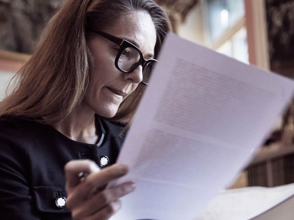 Person analyzing documents