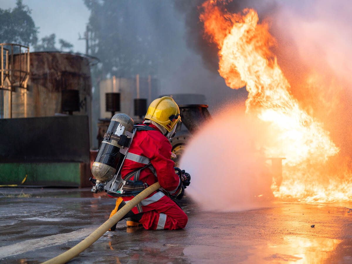 Firefighters Extinguishing Blaze in Industrial Area