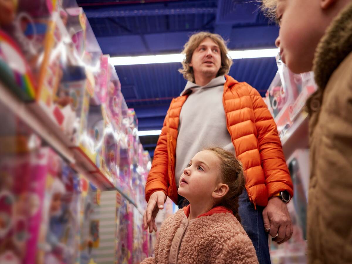 Father and children walking down aisle