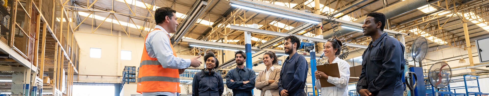 group of people in a warehouse