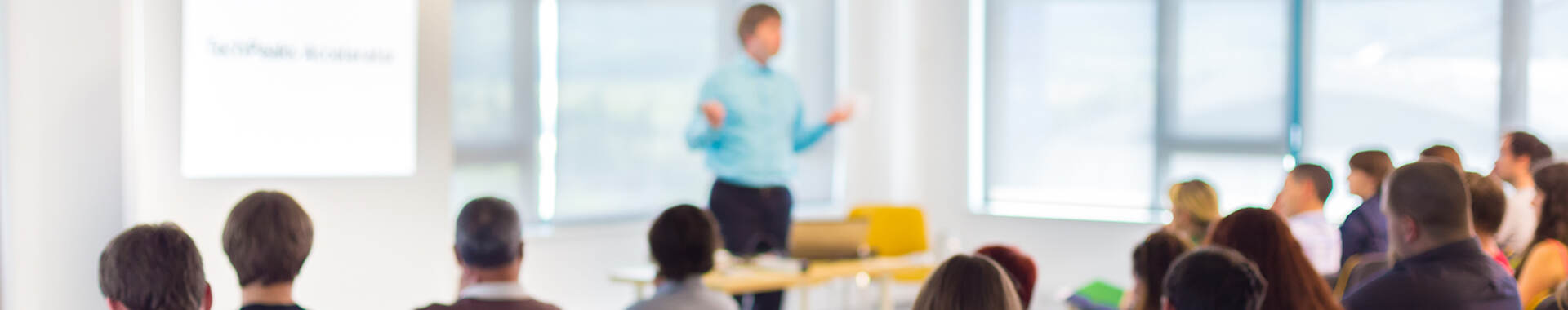 speaker in front of a group